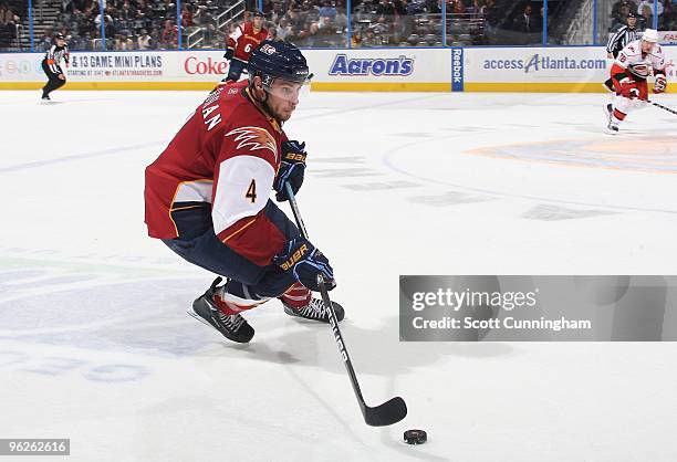 Zach Bogosian of the Atlanta Thrashers carries the puck against the Carolina Hurricanes at Philips Arena on January 21, 2010 in Atlanta, Georgia.