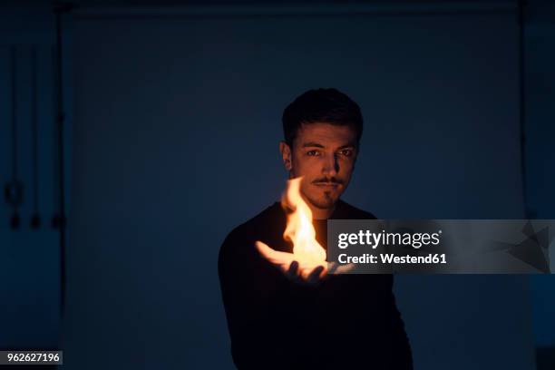 portrait of magician with flame - man on fire 個照片及圖片檔