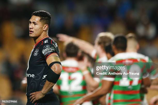 Roger Tuivasa-Sheck of the Warriors looks on as the Rabbitohs score another try during the round 12 NRL match between the New Zealand Warriors and...