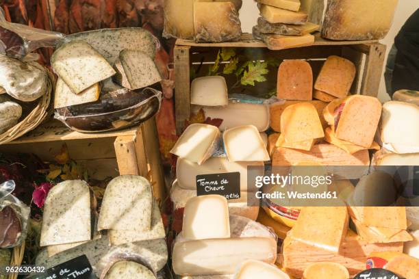 france, paris, presentation of cheese shop - cheese stockfoto's en -beelden