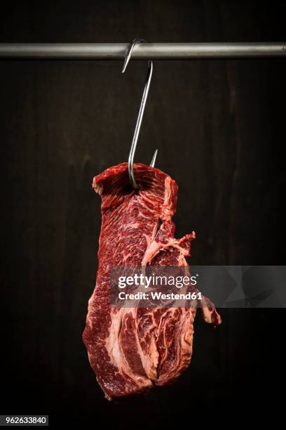 raw american chuck eye steak on hook - red meat stock pictures, royalty-free photos & images