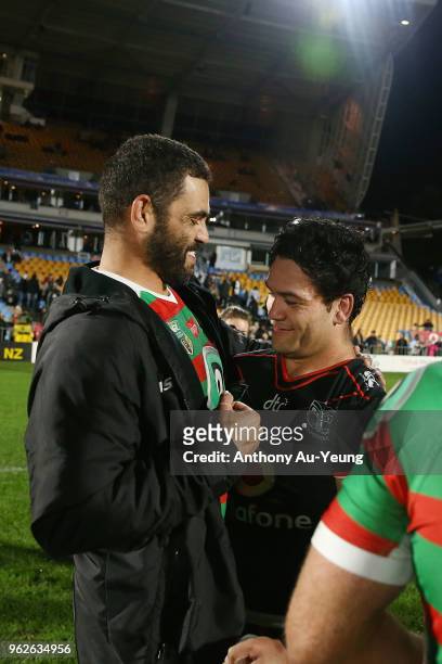 Issac Luke of the Warriors catches up with Greg Inglis of the Rabbitohs after the round 12 NRL match between the New Zealand Warriors and the South...
