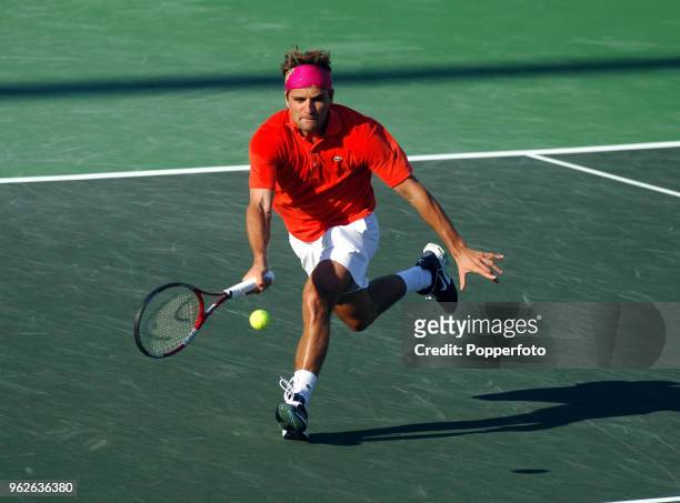 Arnaud Clement of France enroute to losing his second round match during the NASDAQ 100 Open at the Tennis Center at Crandon Park in Miami, Florida...