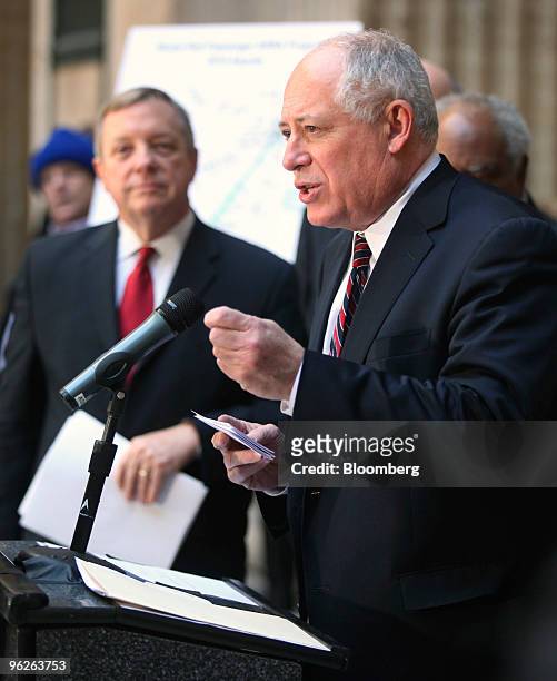 Pat Quinn, governor of Illinois, speaks at a news conference to announce funding for a high-speed rail project as Democratic U.S. Senator Dick Durbin...