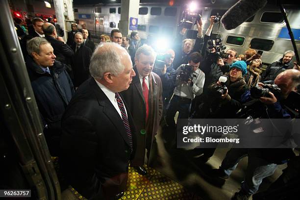 Pat Quinn, governor of Illinois, center left, and U.S. Democratic Senator Dick Durbin, center right, speak to the media following a news conference...