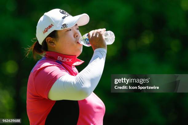 Shanshan Feng, of China, takes a drink of water on the fifth tee during the second round of the LPGA Volvik Championship on May 25, 2018 at Travis...