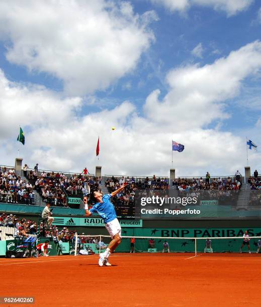 Tim Henman of Great Britain during his match against Kenneth Carlsen of Denmark on day one of the French Open at Roland Garros on May 28, 2006 in...