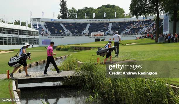 Alexander Bjork of Sweden and Markus Kinhult of Sweden walk onto the 18th green during day three of the BMW PGA Championship at Wentworth on May 26,...