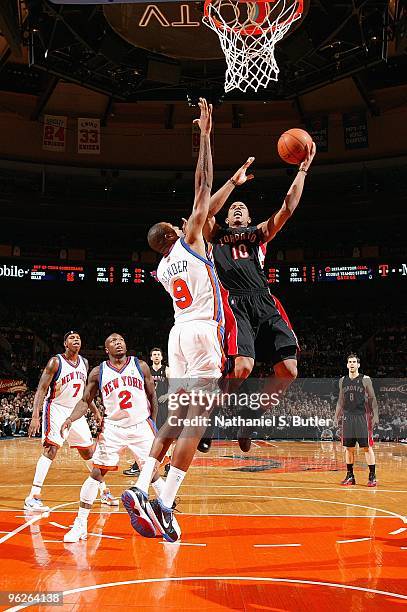 DeMar DeRozan of the Toronto Raptors goes to the basket against Jonathan Bender of the New York Knicks during the game on January 15, 2010 at Madison...