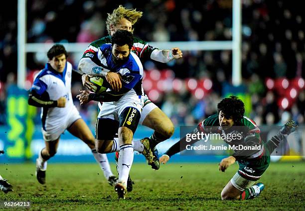 Joe Maddock of Bath is tackled by Billy Twelvetrees of Leicester Tigers during the LV Anglo Welsh Cup match between Leicester Tigers and Bath at...