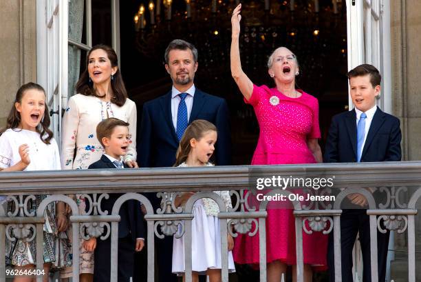 Queen Margrethe of Denmark leads the cheering for Crown Prince Frederik of Denmark /L- 3rd) on the Amalienborg Palace square on the occasion of his...