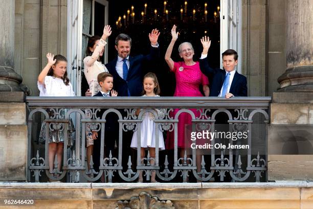 Crown Prince Frederik of Denmark with his family waves ro rhe people on the Amalienborg Palace square on the occasion of his 50th birthday on May 26,...