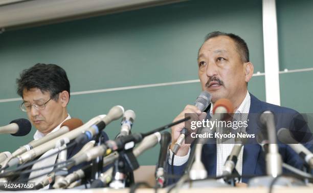 Kwansei Gakuin University American football team head coach Hideaki Toriuchi meets the press in the western Japan city of Nishinomiya on May 26, 2018...