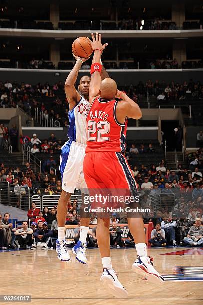 Rasual Butler of the Los Angeles Clippers takes a jump shot against Jarvis Hayes of the New Jersey Nets during the game at Staples Center on January...