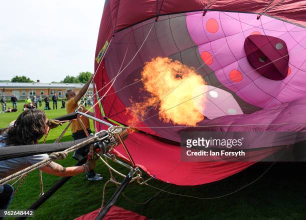 Hot air balloon is inflated during the Durham Hot Air Balloon Festival on May 26, 2018 in Durham, England. Held in the city for the second year the...