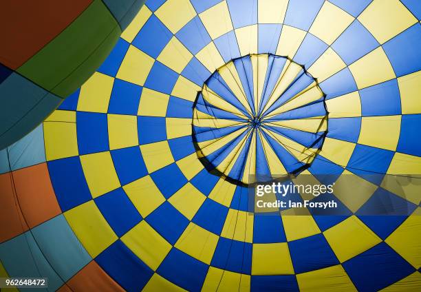 Hot air balloon is tethered to the ground after being inflated during the Durham Hot Air Balloon Festival on May 26, 2018 in Durham, England. Held in...