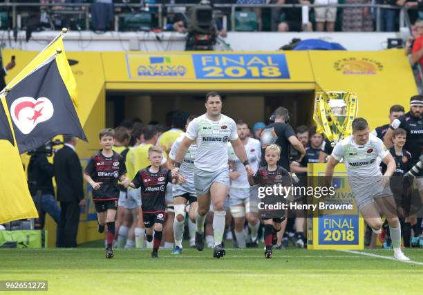 Brad Barritt of Saracens and Owen Farrell of Saracens run out to the pitch prior to the Aviva Premiership Final between Saracens and Exeter Chiefs at...