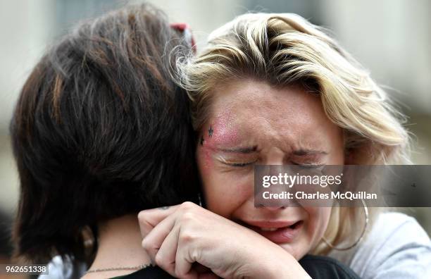 Woman breaks down in tears as the results in the Irish referendum on the 8th amendment concerning the country's abortion laws takes place at Dublin...