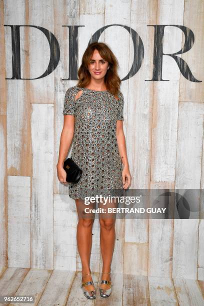 French and Brazilian socialite Alexia Niedzielski poses during the photocall before the 2019 Dior Croisiere fashion show on May 25, 2018 at the...