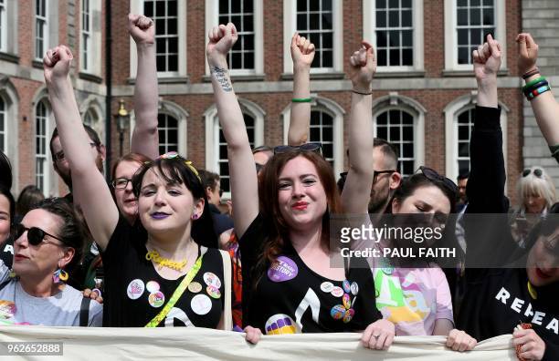 Yes campaigners jubilate as they wait for the official result of the Irish abortion referendum, at Dublin Castle in Dublin on May 26, 2018. - The...