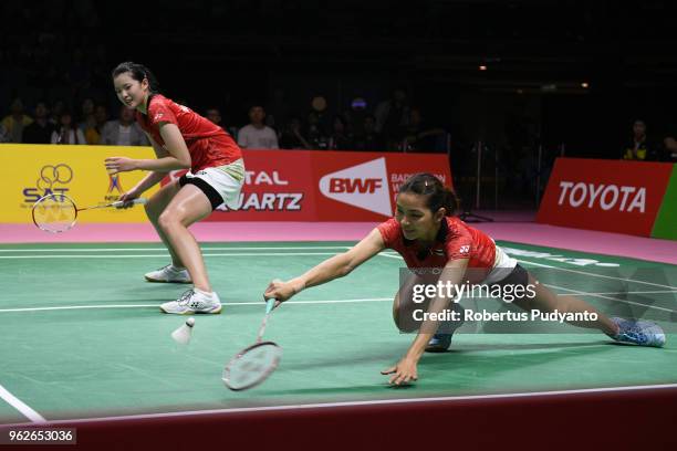 Jongkolphan Kititharakul and Puttita Supajirakul of Thailand compete against Yuki Fukushima and Sayaka Hirota of Japan during the Uber Cup Final...