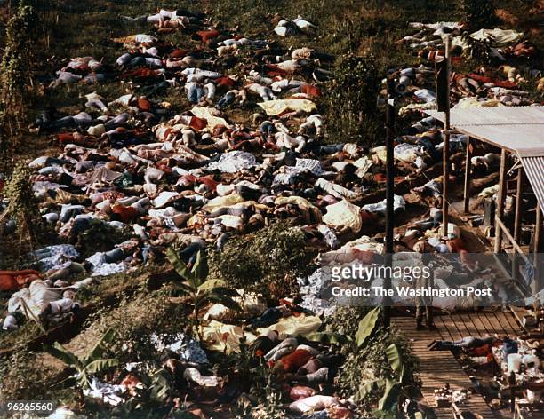 Image depicts death.) JONESTOWN, GUYANA People lie on the ground dead from being forced to commit suicide. Over 900 people died by the direction of...