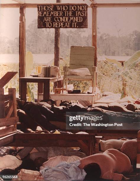 Inside the People's Temple in Jonestown, Guyana. The bodies of followers that drank the cyanide-laced drink are strewn around the commune. More than...