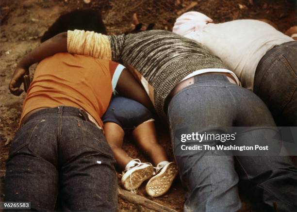 Image depicts death.) JONESTOWN, GUYANA People lie on the ground dead from being forced to commit suicide. Over 900 people died by the direction of...