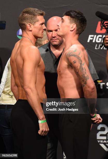 Opponents Stephen Thompson and Darren Till of England face off during the UFC Weigh-in at ECHO Arena on May 26, 2018 in Liverpool, England.