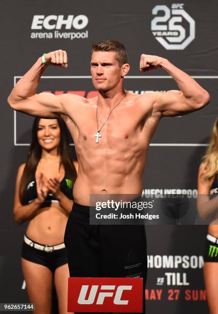 Stephen Thompson poses on the scale during the UFC Weigh-in at ECHO Arena on May 26, 2018 in Liverpool, England.