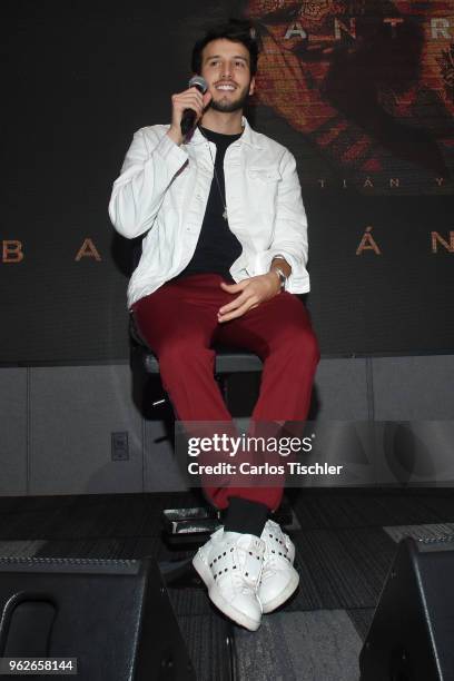 Sebastian Yatra speaks during a press conference as part of the presentation of the album "Mantra" at Universal Music on May 24, 2018 in Mexico City,...