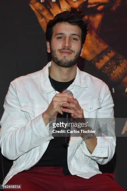 Sebastian Yatra poses for photos during a press conference as part of the presentation of the album "Mantra" at Universal Music on May 24, 2018 in...