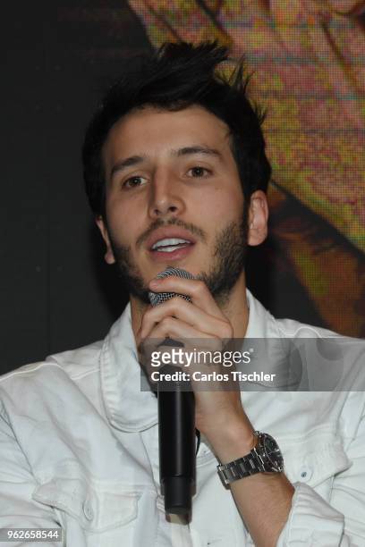 Sebastian Yatra speaks during a press conference as part of the presentation of the album "Mantra" at Universal Music on May 24, 2018 in Mexico City,...