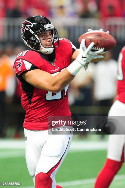 Austin Hooper of the Atlanta Falcons warms up prior to the game against the Minnesota Vikings at Mercedes-Benz Stadium on December 3, 2017 in...