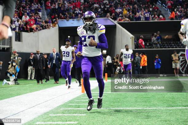 Terence Newman of the Minnesota Vikings runs out on the field against the Atlanta Falcons at Mercedes-Benz Stadium on December 3, 2017 in Atlanta,...