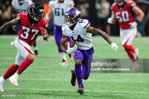 Stefon Diggs of the Minnesota Vikings runs after a catch against the Atlanta Falcons at Mercedes-Benz Stadium on December 3, 2017 in Atlanta, Georgia.