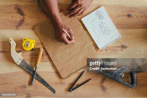 carpenter at work - serrated knife stock pictures, royalty-free photos & images
