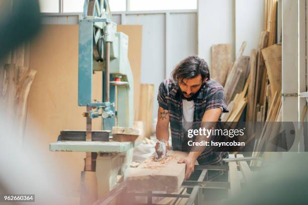 carpenter at work - serrated knife stock pictures, royalty-free photos & images