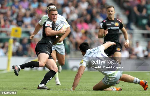 Joe Simmonds of Exeter Chiefs moves away from Sean Maitland of Saracens during the Aviva Premiership Final between Saracens and Exeter Chiefs at...