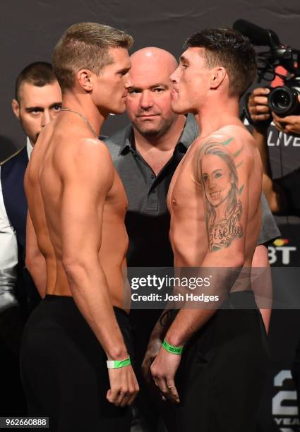 Opponents Stephen Thompson and Darren Till of England face off during the UFC Weigh-in at ECHO Arena on May 26, 2018 in Liverpool, England.