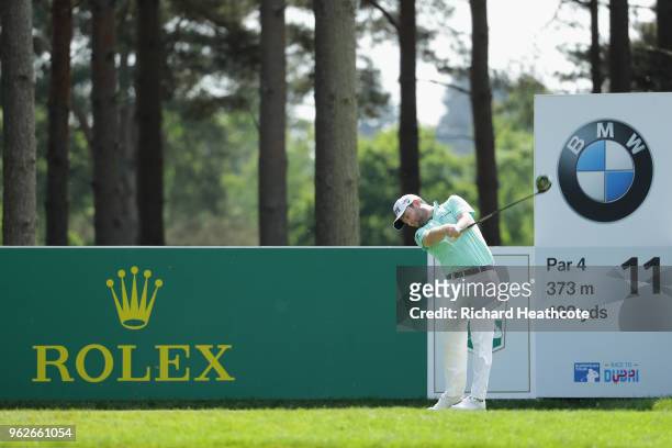 Branden Grace of South Africa tees off on the 11th hole during the third round of the BMW PGA Championship at Wentworth on May 26, 2018 in Virginia...
