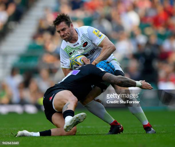 Jack Nowell of Exeter Chiefs tackles Chris Wyles of Saracens during the Aviva Premiership Final between Saracens and Exeter Chiefs at Twickenham...