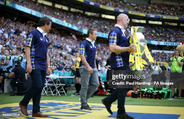 Lawrence Dallaglio, Jonny Wilkinson and Rob Andrew deliver the trophy wearing Scotland shirts in support of Doddie Wear during the Aviva Premiership...