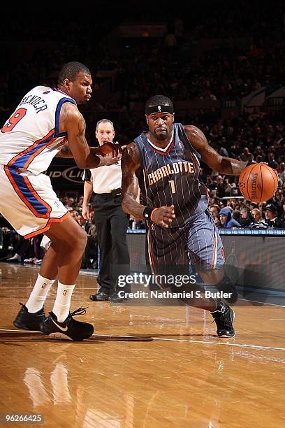 Stephen Jackson of the Charlotte Bobcats drives against Jonathan Bender of the New York Knicks during the game on January 7, 2010 at Madison Square...