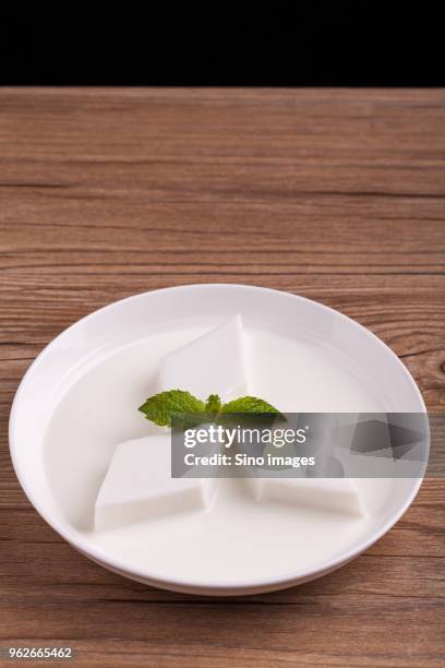 almond jelly with mint leaf - almond jelly stock pictures, royalty-free photos & images