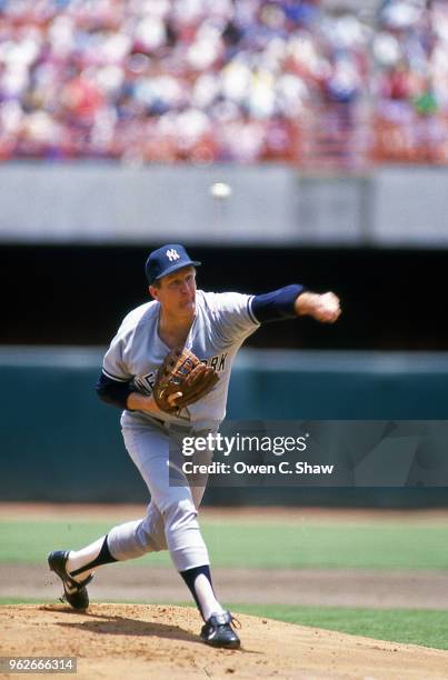 Tommy John of the New York Yankees pitches against the California Angels at the Big A in Anaheim, California.