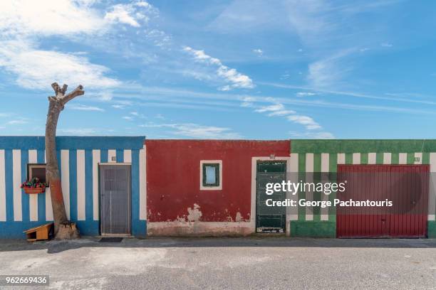 colorful houses against blue sky - peniche stock pictures, royalty-free photos & images