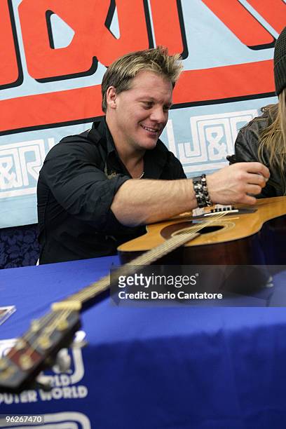 Wrestler Chris Jericho and Rich Ward promote "Chasing The Grail" at J&R Music and Computer World on January 29, 2010 in New York City.