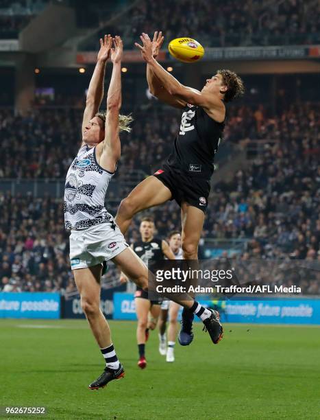 Charlie Curnow of the Blues and Mark Blicavs of the Cats compete for the ball during the 2018 AFL round 10 match between the Geelong Cats and the...