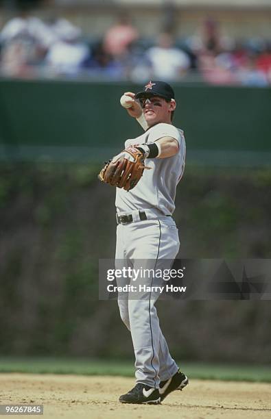 Craig Biggio of the Houston Astros makes a throw during their MLB game against the Chicago Cubs at Wrigley Field on May 3, 2000 in Chicago, Illinois.